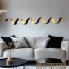 Ausgefallene LED Pendelleuchte HELIX Schwarz / Gold, Breite 125cm