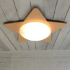 Deckenleuchte Stern fürs Kinderzimmer mit Holz Pfirsichfarben, Ø 53cm & E27 LED
