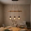 Industrial Pendelleuchte IONA 3-flammig Metall Schwarz mit Holzbalken, B: 75cm