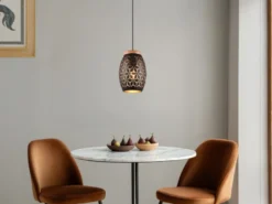 Kleine LED Pendelleuchte in Schwarz/Gold mit ausgefallenem Stanzmuster, Ø 15cm