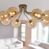 LED Deckenleuchte in Gold mit 8 Glaskugeln Bernsteinfarbig, Breite 88cm
