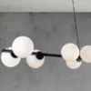 Pendelleuchte PLUTO 6 flammig Schwarz & Opalglas Kugeln Weiß, Breite 80cm