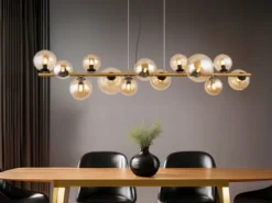 Pendelleuchte RIHA Messing-Schwarz 13-flammig mit Glaskugeln Bernstein, B: 120cm